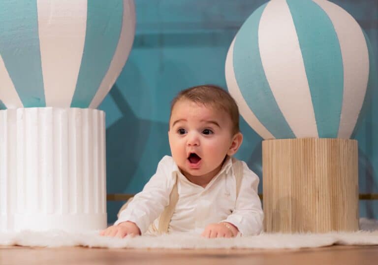Photo by Larbigno •: https://www.pexels.com/photo/adorable-baby-surprised-amidst-balloon-decor-28992484/