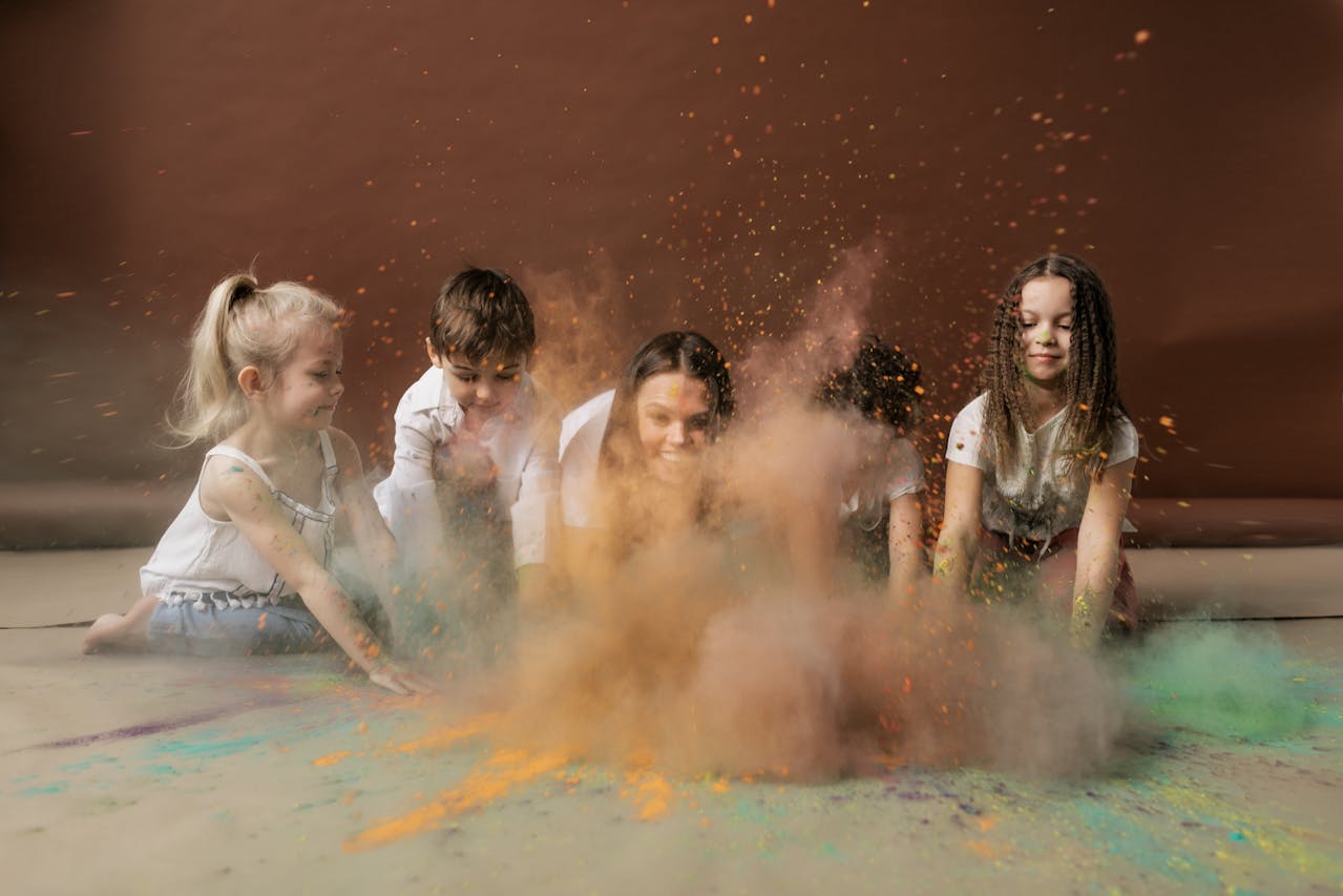 Photo by Alena Darmel: https://www.pexels.com/photo/kids-playing-with-colored-powder-7176461/