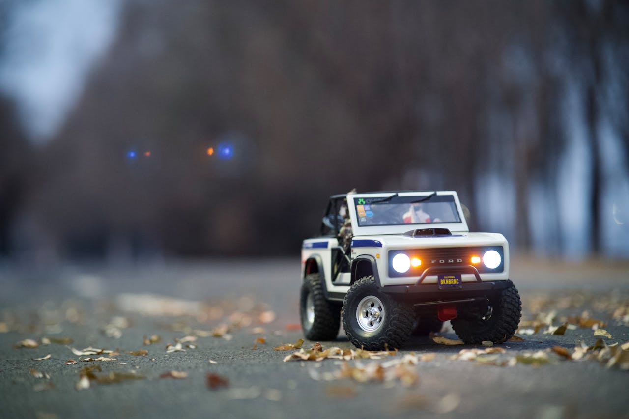Photo by xinyu liu: https://www.pexels.com/photo/close-up-shot-of-a-toy-car-on-the-road-10387799/