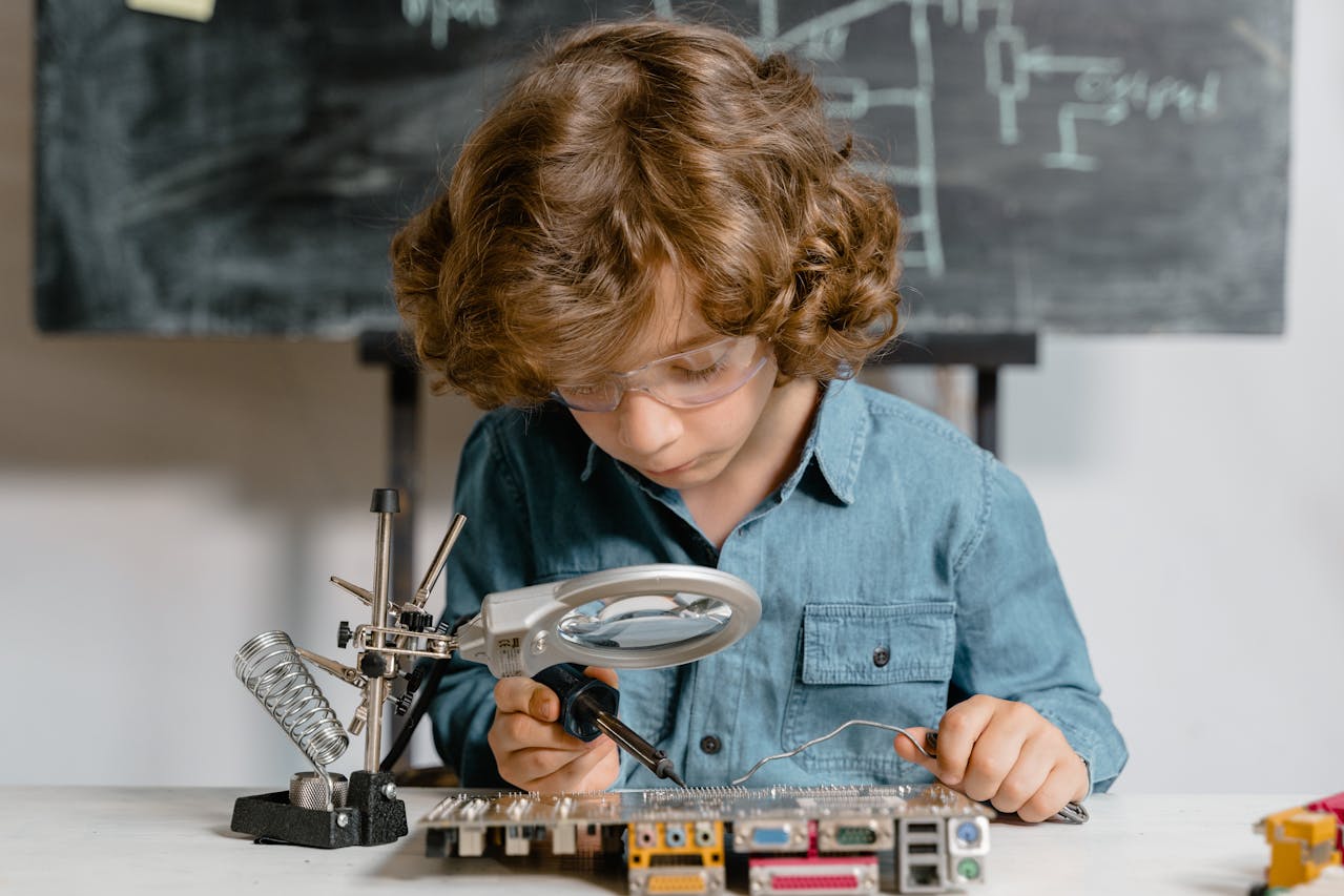 Photo by MART  PRODUCTION: https://www.pexels.com/photo/close-up-photo-of-a-smart-boy-doing-a-science-experiment-8471939/