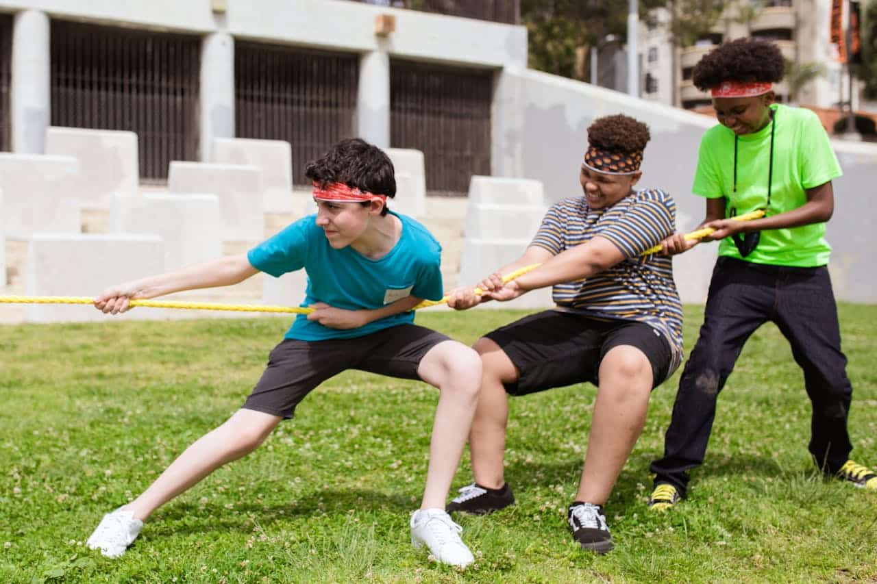 Photo by RDNE Stock project: https://www.pexels.com/photo/a-group-of-boys-playing-a-tug-of-war-8034584/
