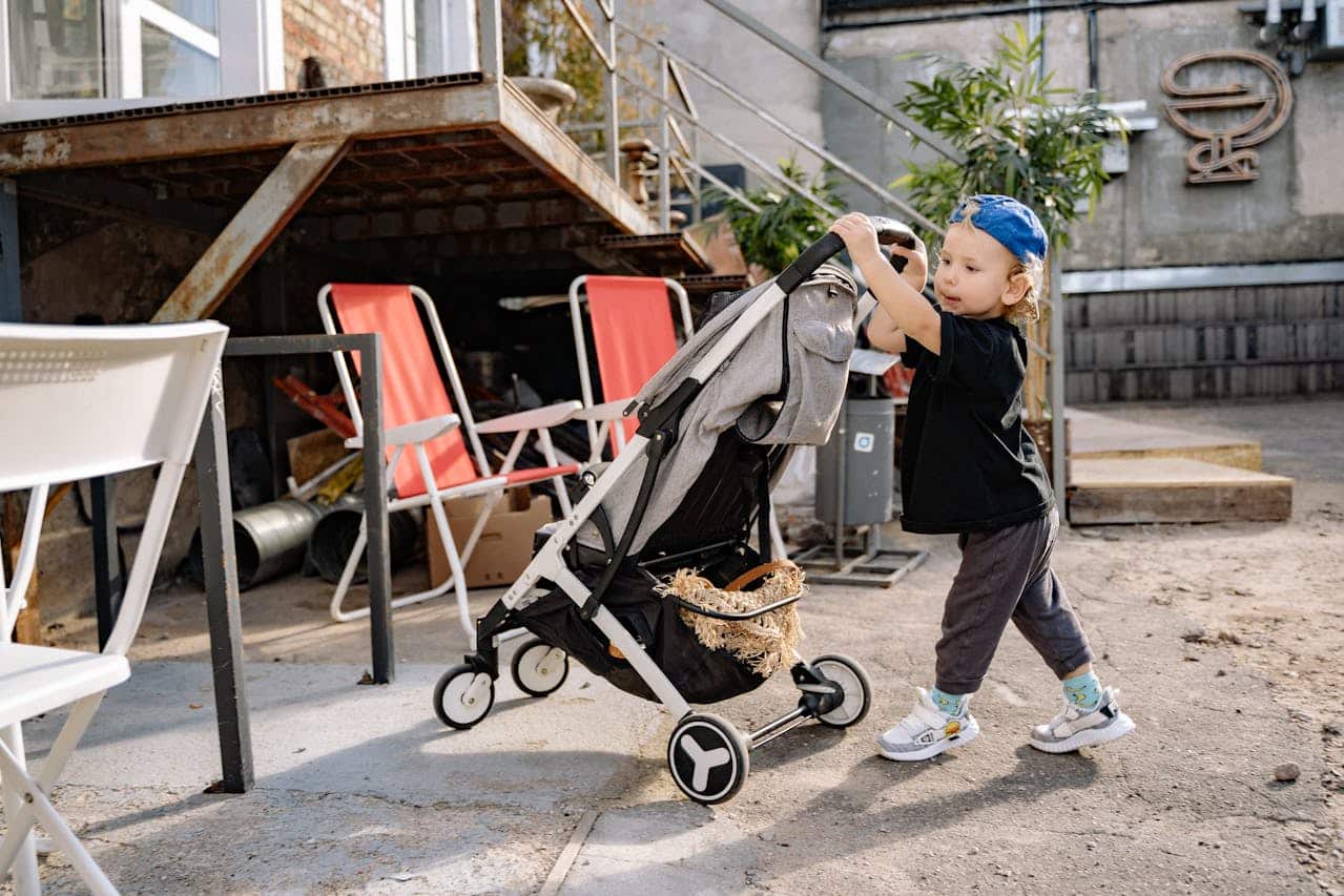Photo by Yan Krukau: https://www.pexels.com/photo/child-pushing-a-stroller-5224346/